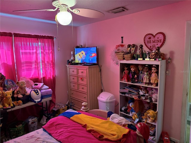 11314 Huggins St, Leesburg, FL 34788 - bedroom with a ceiling fan