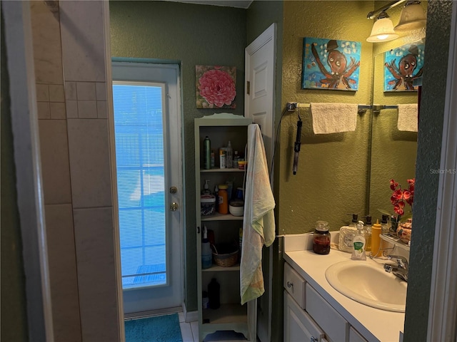 11314 Huggins St, Leesburg, FL 34788 - bathroom with a textured wall and vanity