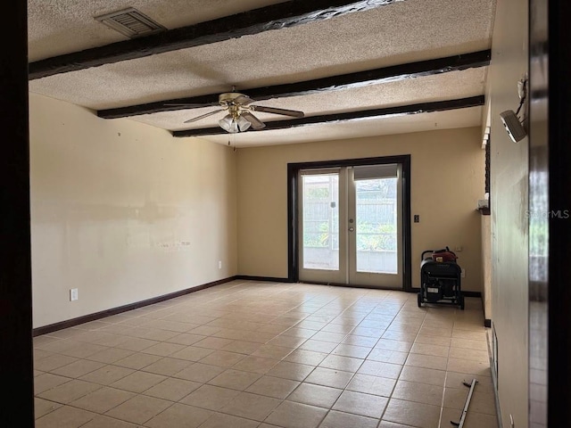 6616 Blanche Ct, Orlando, FL 32818 - spare room with a textured ceiling, light tile patterned flooring, a ceiling fan, french doors, and beam ceiling