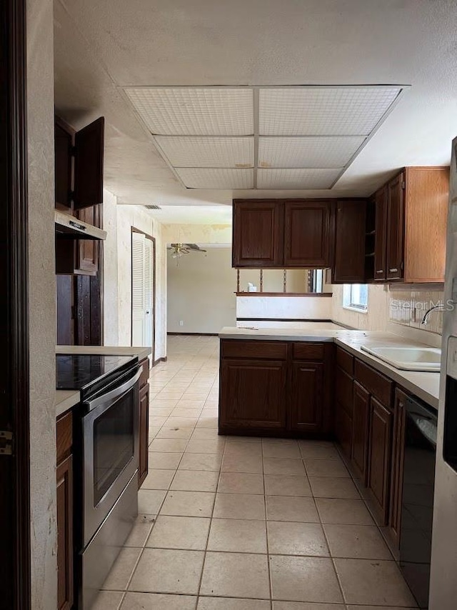 6616 Blanche Ct, Orlando, FL 32818 - kitchen featuring stainless steel electric stove, open shelves, a sink, and dishwasher