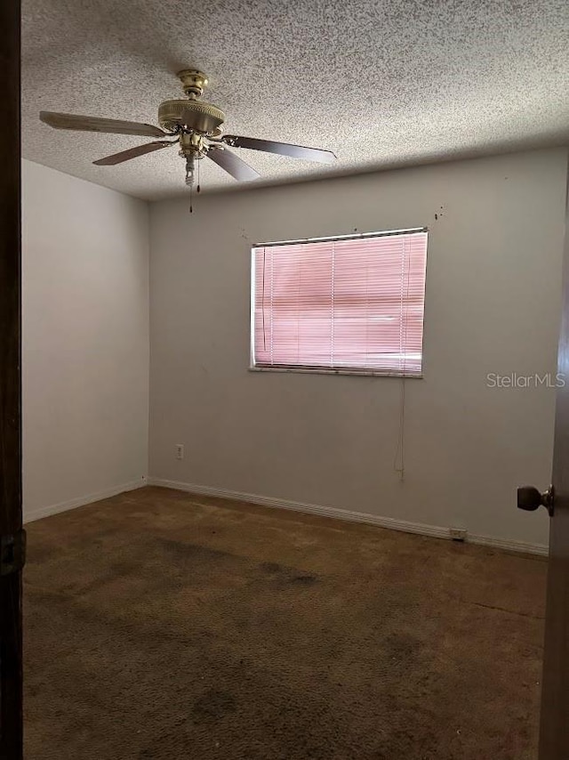 6616 Blanche Ct, Orlando, FL 32818 - carpeted spare room with ceiling fan, a textured ceiling, and baseboards