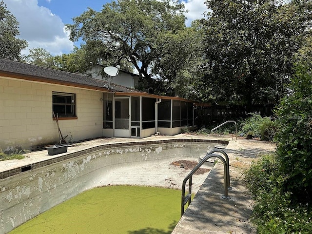 6616 Blanche Ct, Orlando, FL 32818 - view of pool with a sunroom and a patio area
