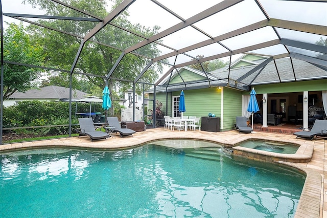 8335 Lake Burden Cir, Windermere, FL 34786 - view of swimming pool with a patio, glass enclosure, and a pool with connected hot tub