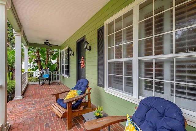 8335 Lake Burden Cir, Windermere, FL 34786 - covered porch with ceiling fan