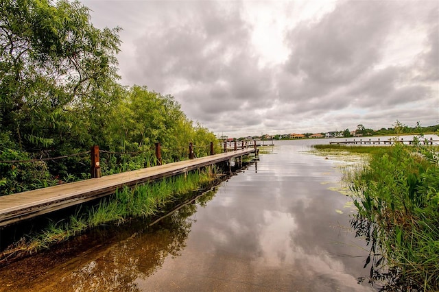 8335 Lake Burden Cir, Windermere, FL 34786 - dock area featuring a water view