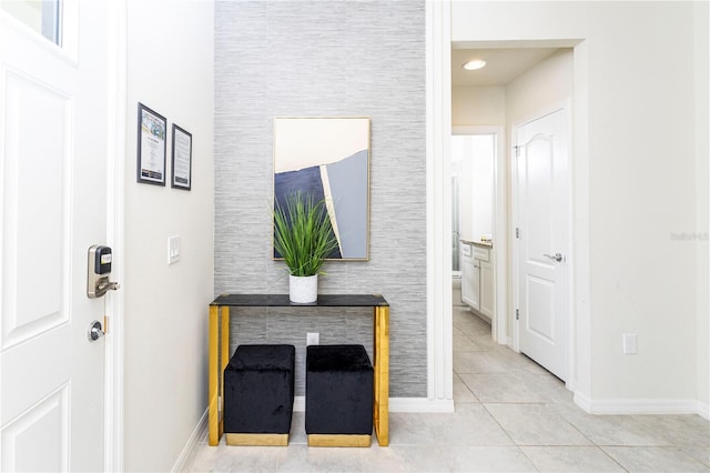 2439 Dubai St, Kissimmee, FL 34747 - foyer entrance featuring light tile patterned floors and baseboards