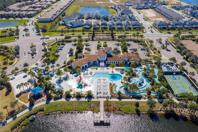 2439 Dubai St, Kissimmee, FL 34747 - aerial view of property's location with a pool area and nearby suburban area