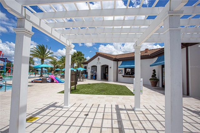 2439 Dubai St, Kissimmee, FL 34747 - view of patio featuring a pergola