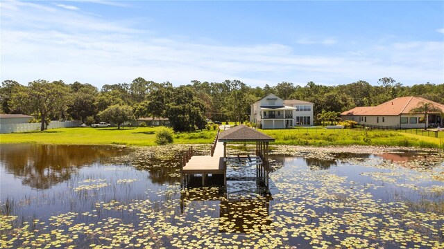 7706 Ficquette Rd, Windermere, FL 34786 - dock area with a water view, a gazebo, and a yard