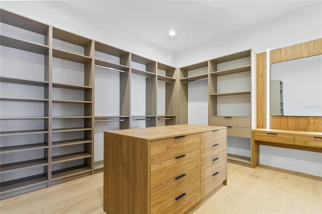 7706 Ficquette Rd, Windermere, FL 34786 - walk in closet featuring light wood-type flooring