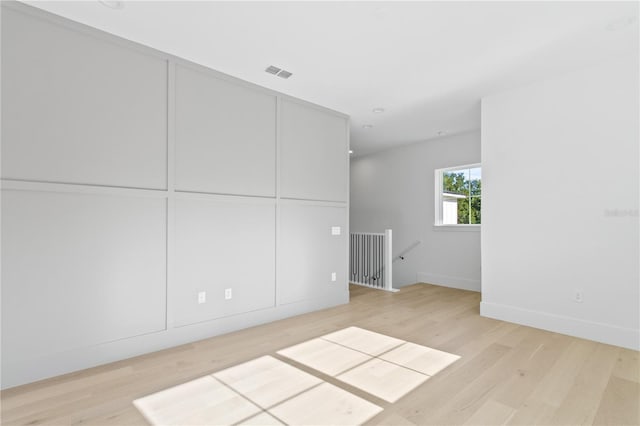 7706 Ficquette Rd, Windermere, FL 34786 - unfurnished room featuring wood finished floors and baseboards