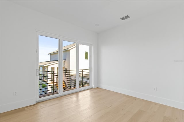 7706 Ficquette Rd, Windermere, FL 34786 - empty room with light wood finished floors