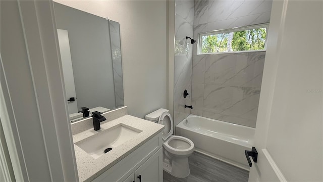 285 Marion Oaks Crse, Ocala, FL 34473 - full bath featuring toilet, vanity, shower / washtub combination, and wood finished floors