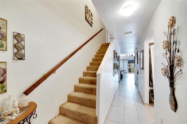 2826 NE 7th St, Ocala, FL 34470 - staircase with tile patterned floors