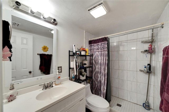 2826 NE 7th St, Ocala, FL 34470 - bathroom featuring a stall shower, vanity, and toilet