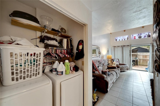 2826 NE 7th St, Ocala, FL 34470 - laundry area with light tile patterned flooring and washer and clothes dryer