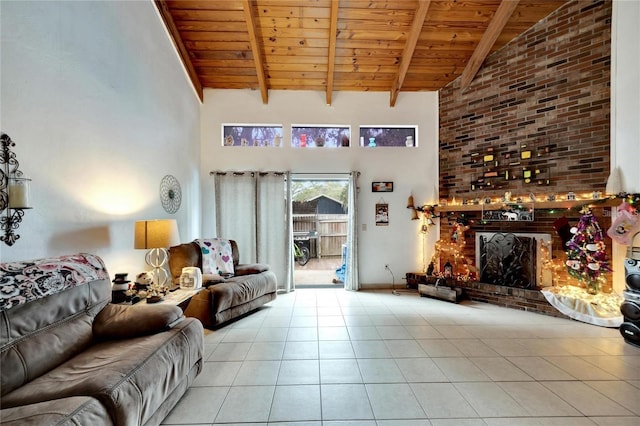 2826 NE 7th St, Ocala, FL 34470 - living room featuring wooden ceiling with exposed beams, high vaulted ceiling, and tile patterned floors