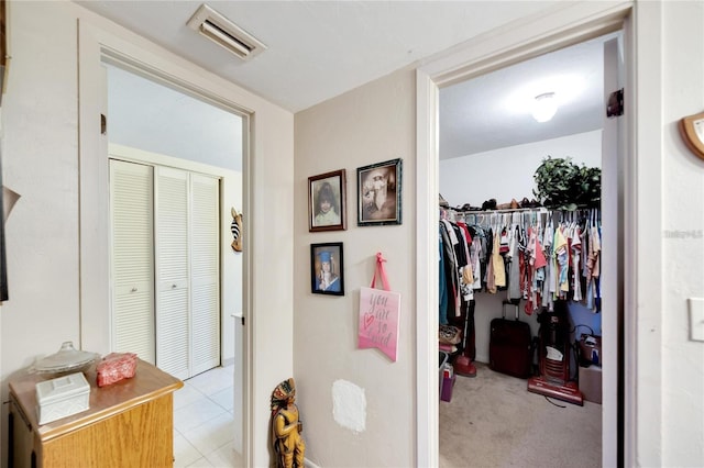 2826 NE 7th St, Ocala, FL 34470 - hall featuring light tile patterned floors
