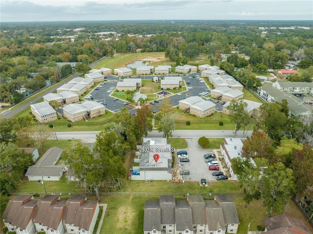 2826 NE 7th St, Ocala, FL 34470 - aerial view of property and surrounding area featuring nearby suburban area
