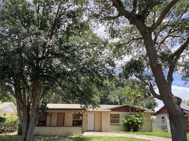 2023 Messina Ave, Orlando, FL 32811 - ranch-style home with stucco siding