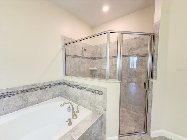 4632 Egg Harbor Dr, Kissimmee, FL 34746 - bathroom featuring a bath and a shower stall