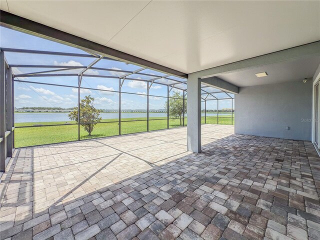 4632 Egg Harbor Dr, Kissimmee, FL 34746 - unfurnished sunroom featuring a water view