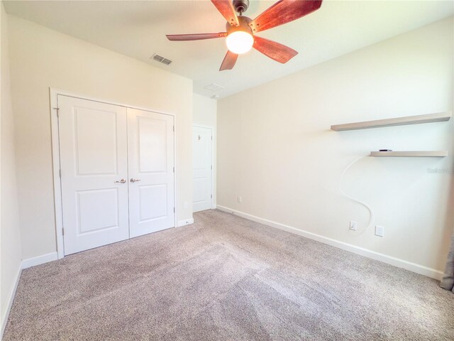 4632 Egg Harbor Dr, Kissimmee, FL 34746 - unfurnished bedroom with carpet flooring, baseboards, a closet, and a ceiling fan