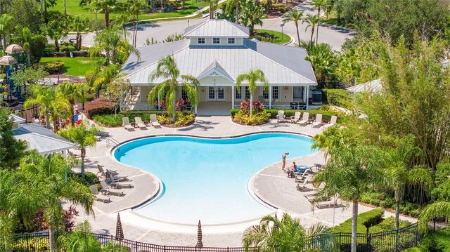 14231 Desert Haven St Unit Ge, Windermere, FL 34786 - community pool with a patio area