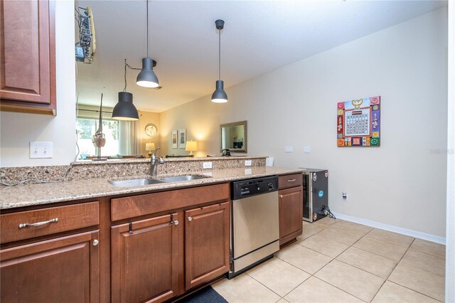14231 Desert Haven St Unit Ge, Windermere, FL 34786 - kitchen featuring dishwasher, a sink, pendant lighting, and light stone counters