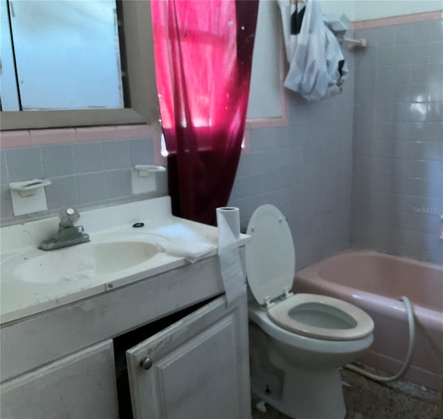 58 W 27th St Unit N, West Palm Beach, FL 33404 - full bath featuring tile walls, vanity, and toilet