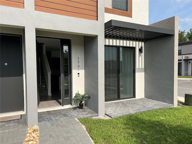3301 Tranquil Trl, Kissimmee, FL 34747 - property entrance featuring stucco siding