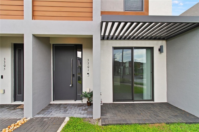 3301 Tranquil Trl, Kissimmee, FL 34747 - doorway to property featuring stucco siding