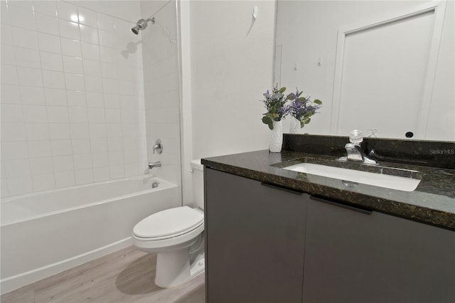 3301 Tranquil Trl, Kissimmee, FL 34747 - full bath featuring vanity, wood finished floors, and shower / tub combination