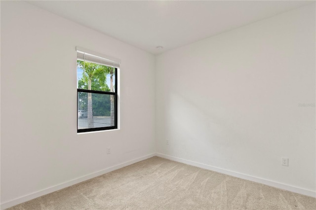 3301 Tranquil Trl, Kissimmee, FL 34747 - spare room with light carpet and baseboards