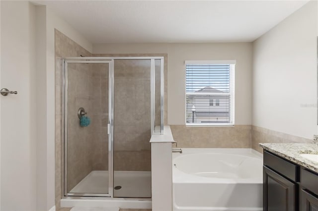 5217 Creekside Park Ave, Orlando, FL 32811 - full bathroom with a bath, vanity, and a stall shower