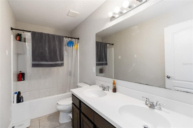 5217 Creekside Park Ave, Orlando, FL 32811 - bathroom featuring toilet, double vanity, shower / bath combo with shower curtain, and tile patterned floors