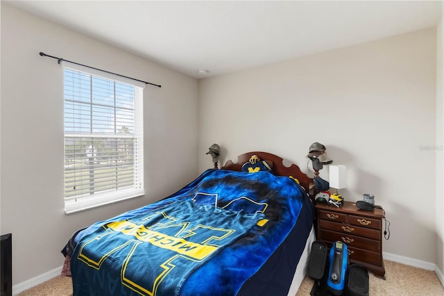 5217 Creekside Park Ave, Orlando, FL 32811 - carpeted bedroom with baseboards