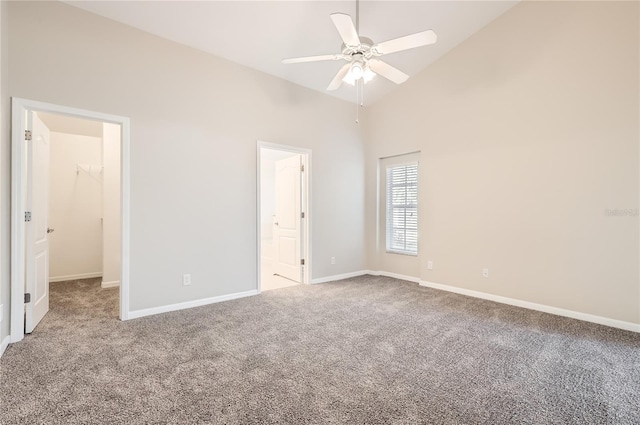 4305 Balmoral Ct, Wesley Chapel, FL 33543 - unfurnished bedroom with carpet floors, a spacious closet, high vaulted ceiling, baseboards, and ensuite bath
