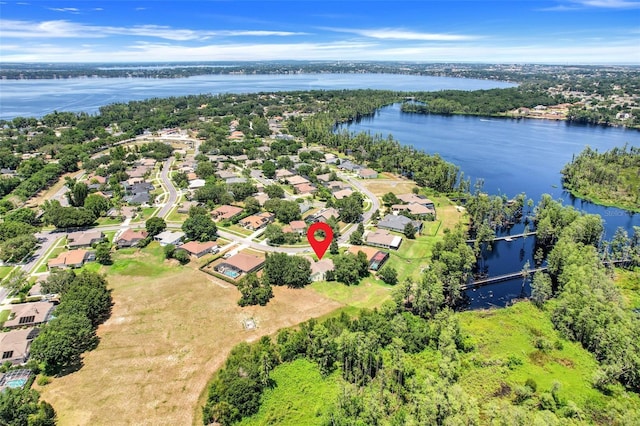 11602 Graces Way, Clermont, FL 34711 - aerial perspective of suburban area with a nearby body of water