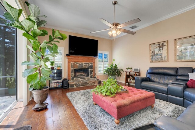 11602 Graces Way, Clermont, FL 34711 - living area with a ceiling fan, crown molding, hardwood / wood-style flooring, and a fireplace