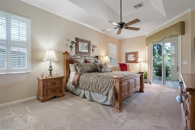 11602 Graces Way, Clermont, FL 34711 - bedroom featuring light carpet, access to outside, multiple windows, ornamental molding, and ceiling fan