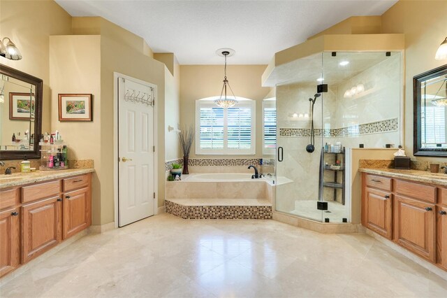 11602 Graces Way, Clermont, FL 34711 - full bathroom with healthy amount of natural light, a garden tub, a stall shower, and vanity