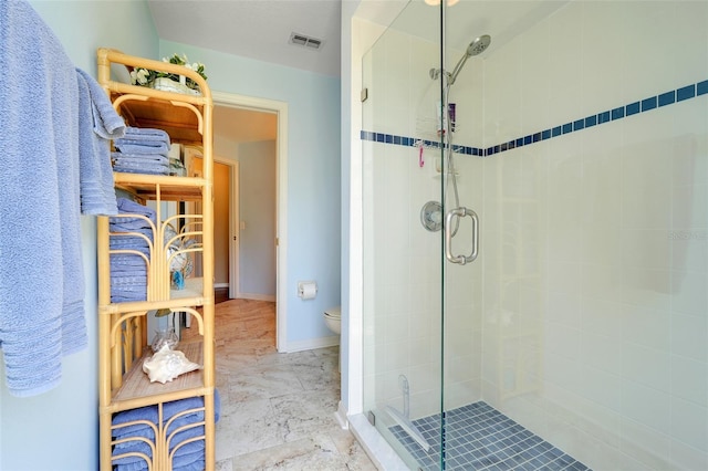 11602 Graces Way, Clermont, FL 34711 - full bathroom featuring a shower stall, toilet, and baseboards