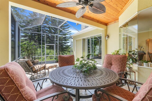 11602 Graces Way, Clermont, FL 34711 - sunroom with a ceiling fan and outdoor dining area