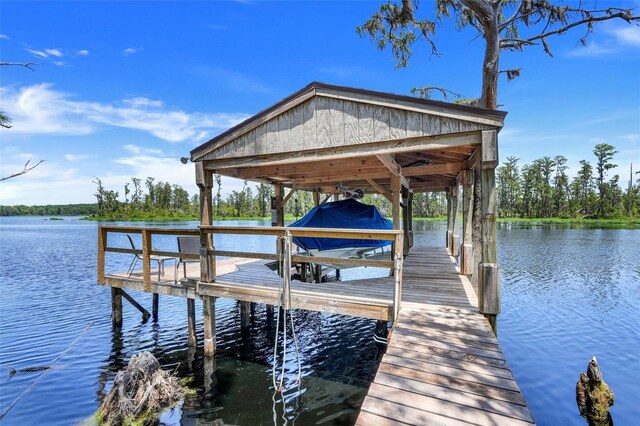 11602 Graces Way, Clermont, FL 34711 - dock area featuring boat lift and a water view