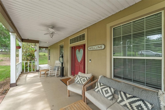 17523 Doris St, Montverde, FL 34756 - covered porch with a ceiling fan