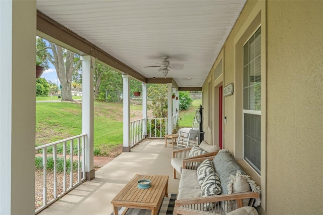 17523 Doris St, Montverde, FL 34756 - covered porch with ceiling fan and a yard