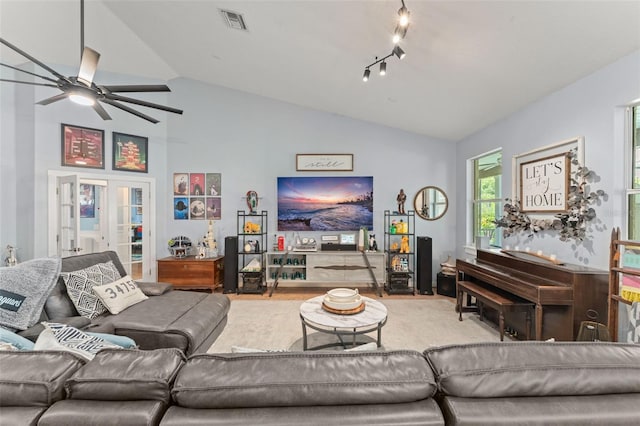 17523 Doris St, Montverde, FL 34756 - living area with vaulted ceiling, ceiling fan, wood finished floors, and french doors