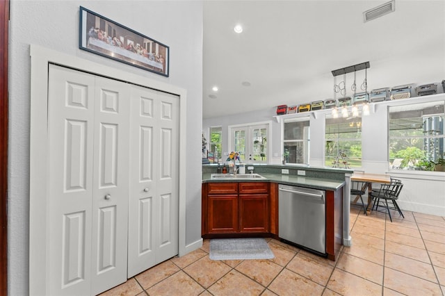 17523 Doris St, Montverde, FL 34756 - kitchen featuring dishwasher, light tile patterned floors, a sink, dark countertops, and recessed lighting