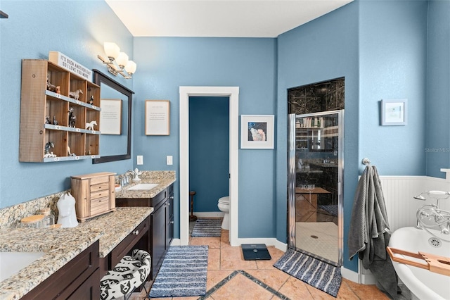 17523 Doris St, Montverde, FL 34756 - full bath with a stall shower, vanity, a soaking tub, tile patterned flooring, and toilet